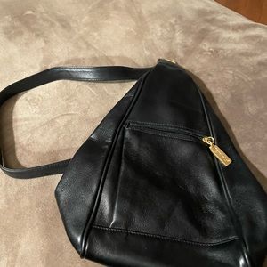 One strap black leather backpack